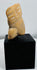 Pre-Columbian anthropomorphic terracotta head fragment exhibiting weathering consistent with long-term burial.