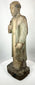 Spanish Colonial devotional wooden saint figure holding a book