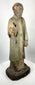 Spanish Colonial folk art religious sculpture with aged cracking and wear