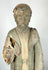 Colonial Latin American carved wood saint with expressive facial features