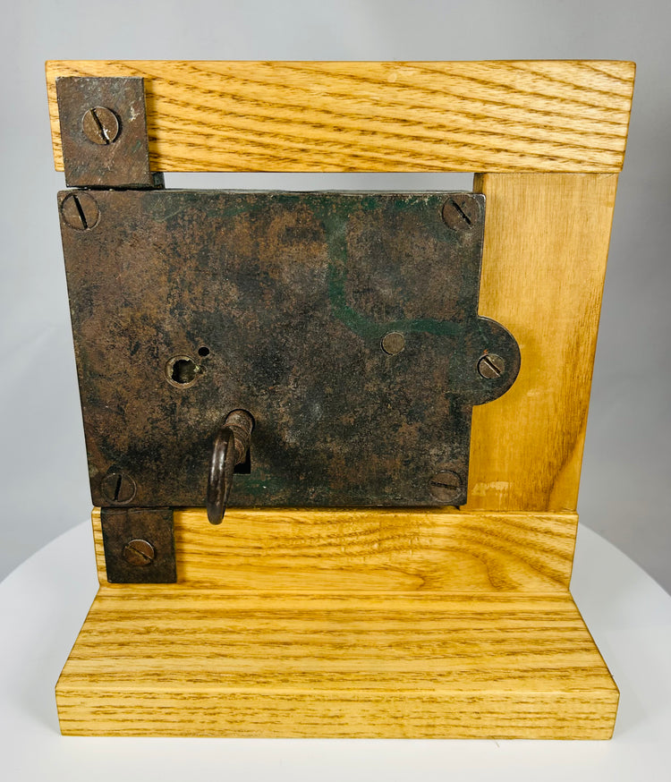 Antique locking mechanism with hand-forged iron construction and key