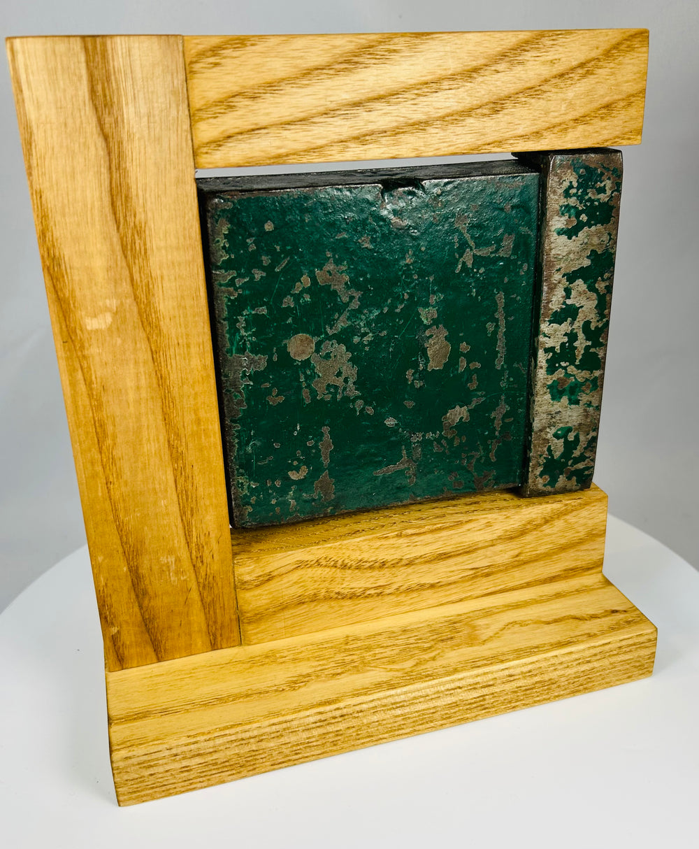 19th century rim lock with skeleton key mounted on wooden display stand