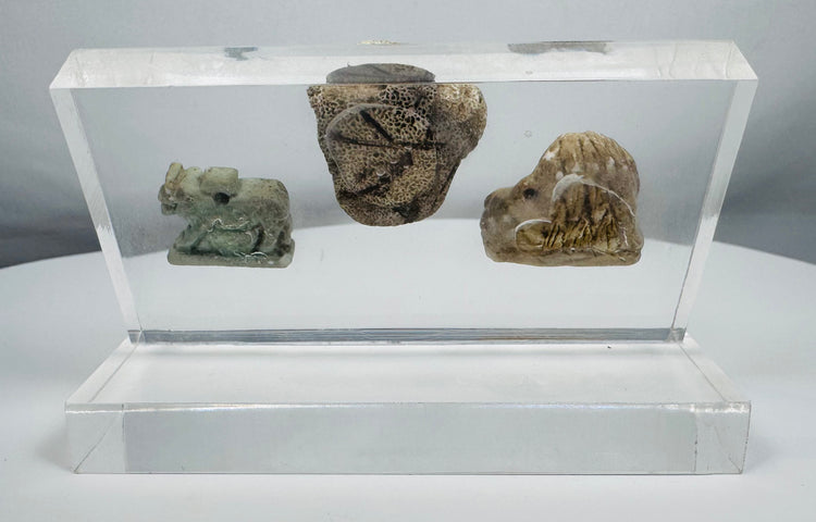 Three authentic ancient artifacts showcasing religious symbolism and artistic traditions of Egypt and the Greco-Roman world.