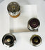 Vintage inkwell collection with varied finishes and original components