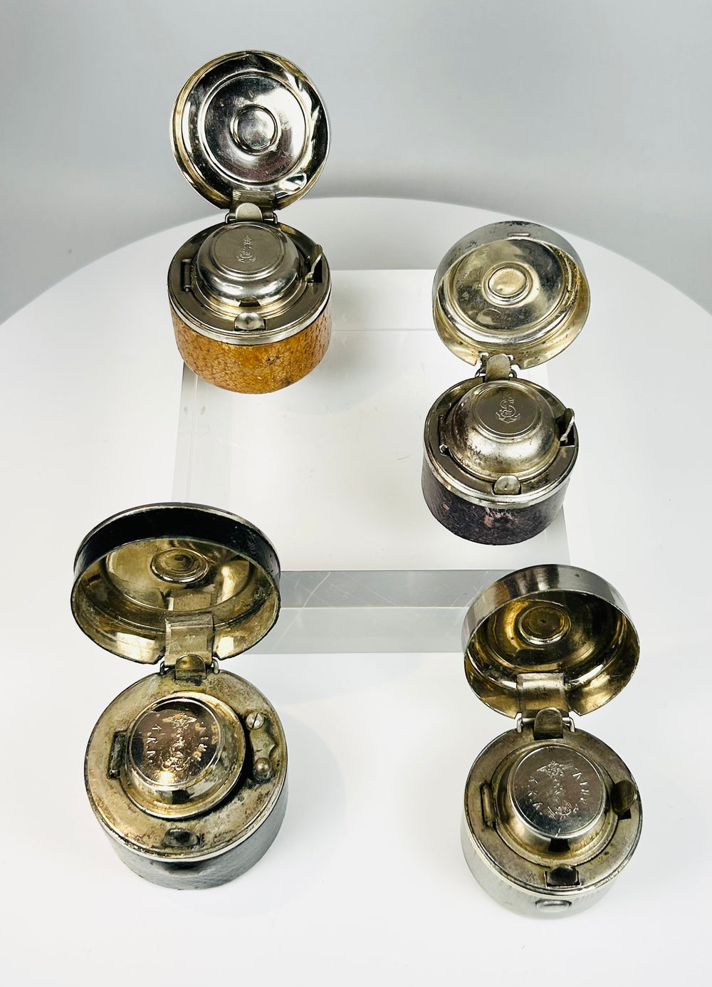 Travel inkwells from the late 1800s with compact cylindrical design