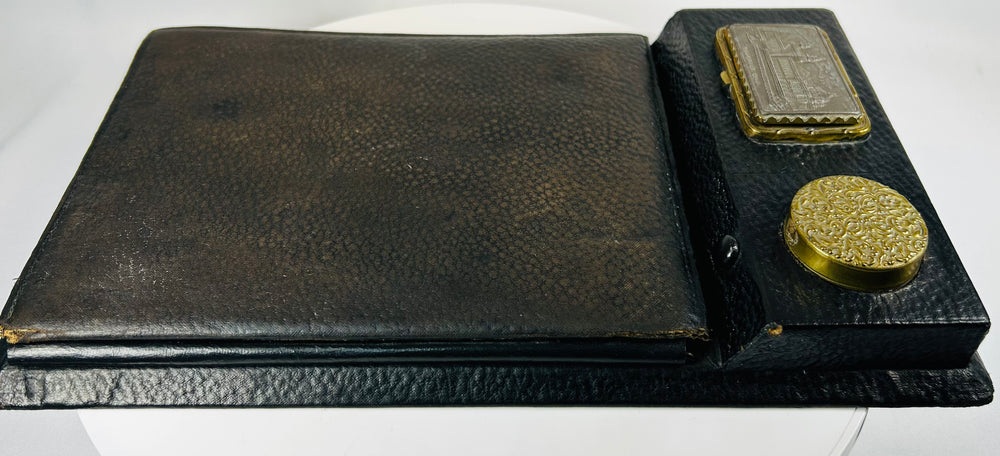 Victorian era portable desk with circular inkwell container and compartments