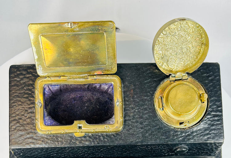 Vintage portable writing box with sloped surface and internal storage