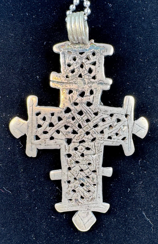 Authentic vintage Ethiopian devotional cross representing the rich traditions of Ethiopian Orthodox Christianity.