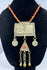 Central Asian Turkmen ceremonial necklace featuring silver-toned metal, coin pendants, and a triangular tumar pendant.