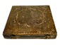 Closed Victorian photographic case from circa 1850–1865, featuring an embossed exterior with intricate floral and scrolling ornamentation.