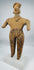 Ancient Colima standing female figure with elaborate headdress, applied decorative details, and archaeological patina.