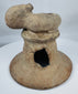 Pre-Columbian terracotta incensario from Ecuador with expressive anthropomorphic sculpture and weathered archaeological surface.