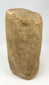 Ancient carved stone idol with minimalist anthropomorphic design, circa 500–1000 CE