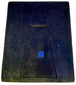 Back of a Victorian velvet photographic presentation case showing the integrated folding easel support and blue textile pull tab.