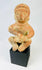 Hand-molded West Mexican terracotta figure with red slip, stylized anthropomorphic features, burnished surface