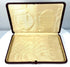 Empty open antique portrait presentation case showing its cream-coloured patterned lining and fitted compartment with the portrait panel removed.