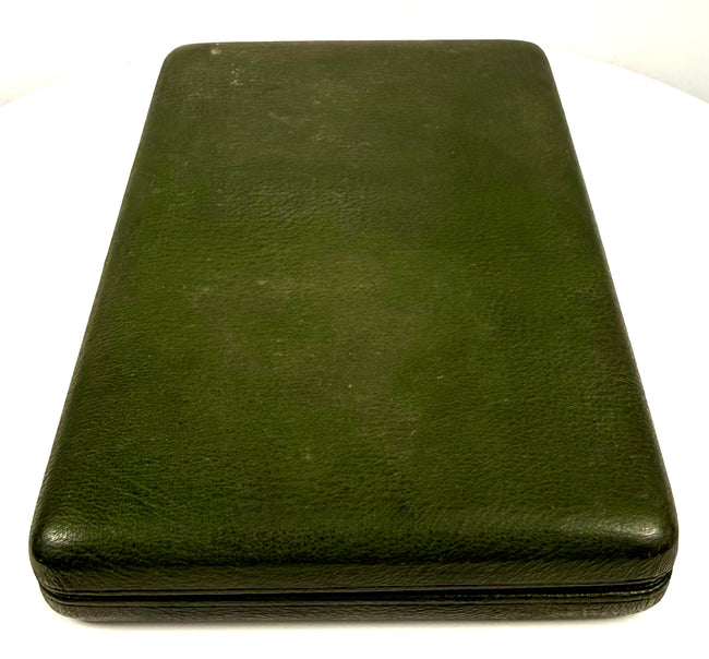 Full exterior view of a closed Victorian double portrait presentation case with dark green textured covering and rectangular shape.