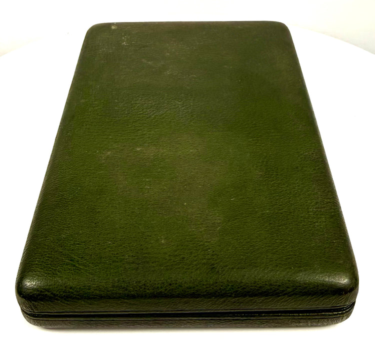 Full exterior view of a closed Victorian double portrait presentation case with dark green textured covering and rectangular shape.