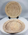 Ancient Roman terracotta serving bowls from Tunisia featuring shallow forms, concentric molded rims, and archaeological patina.