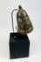 Cast bronze Tibetan ceremonial bell used in Vajrayana Buddhist rituals.