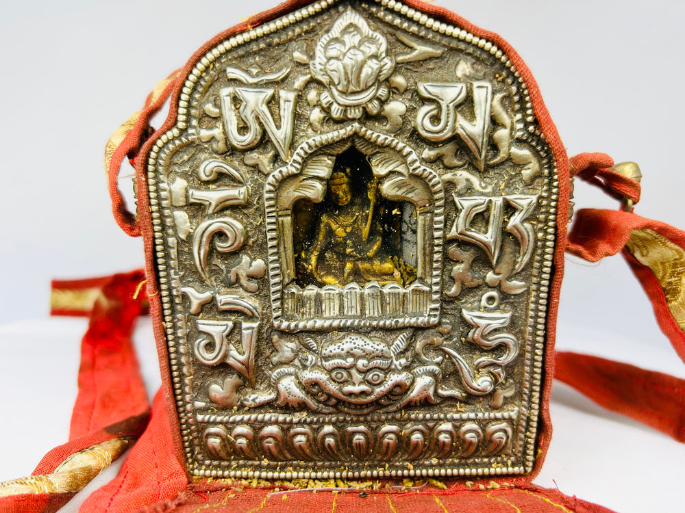 Portable Buddhist reliquary Gau shrine from Tibet with fabric carrying strap