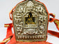 Portable Buddhist reliquary Gau shrine from Tibet with fabric carrying strap