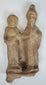 Authentic Magna Graecia terracotta sculpture featuring two stylized figures dating to the Greek Colonial Period.