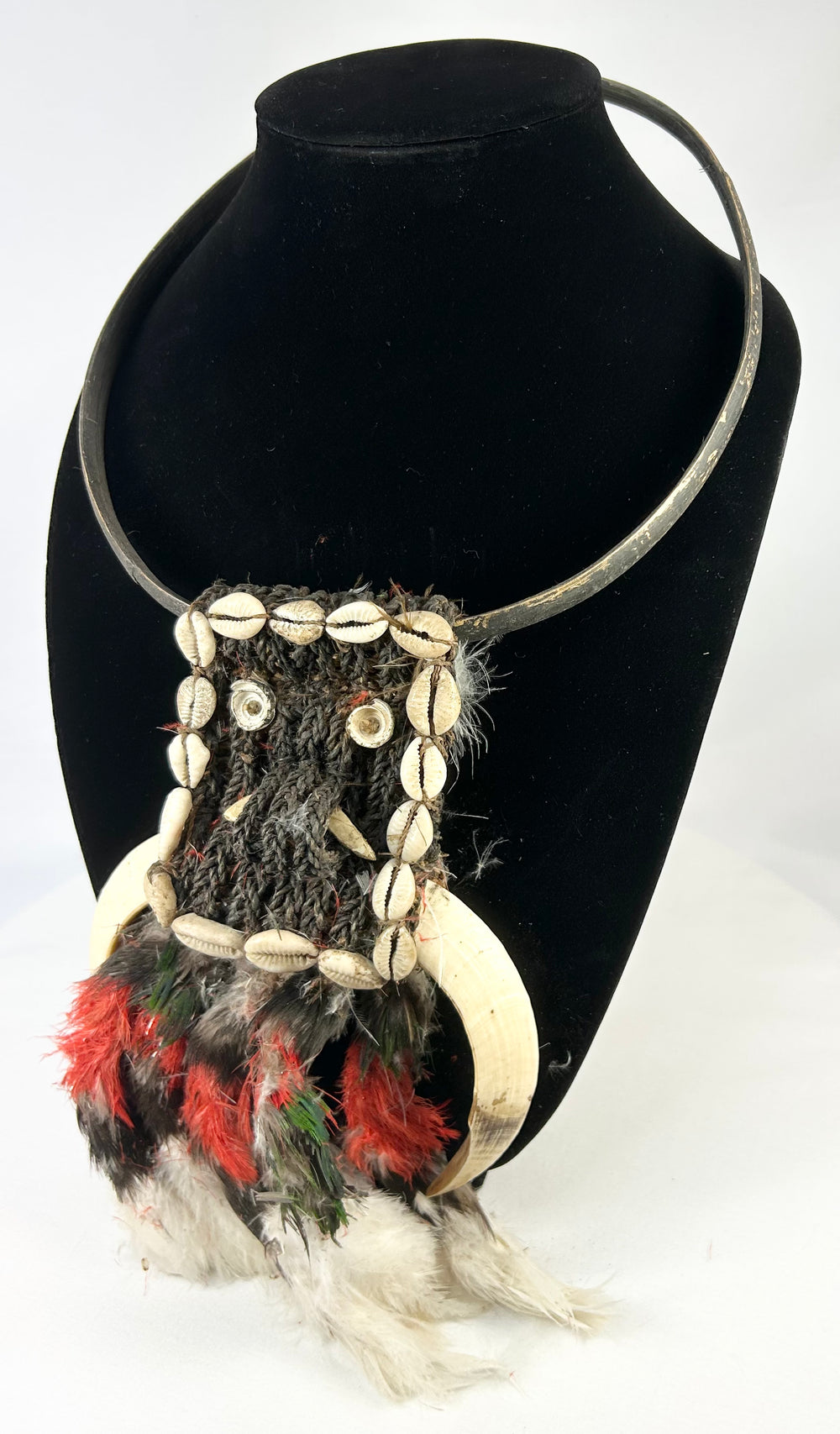 Papua New Guinea ceremonial dance necklace mounted on display stand