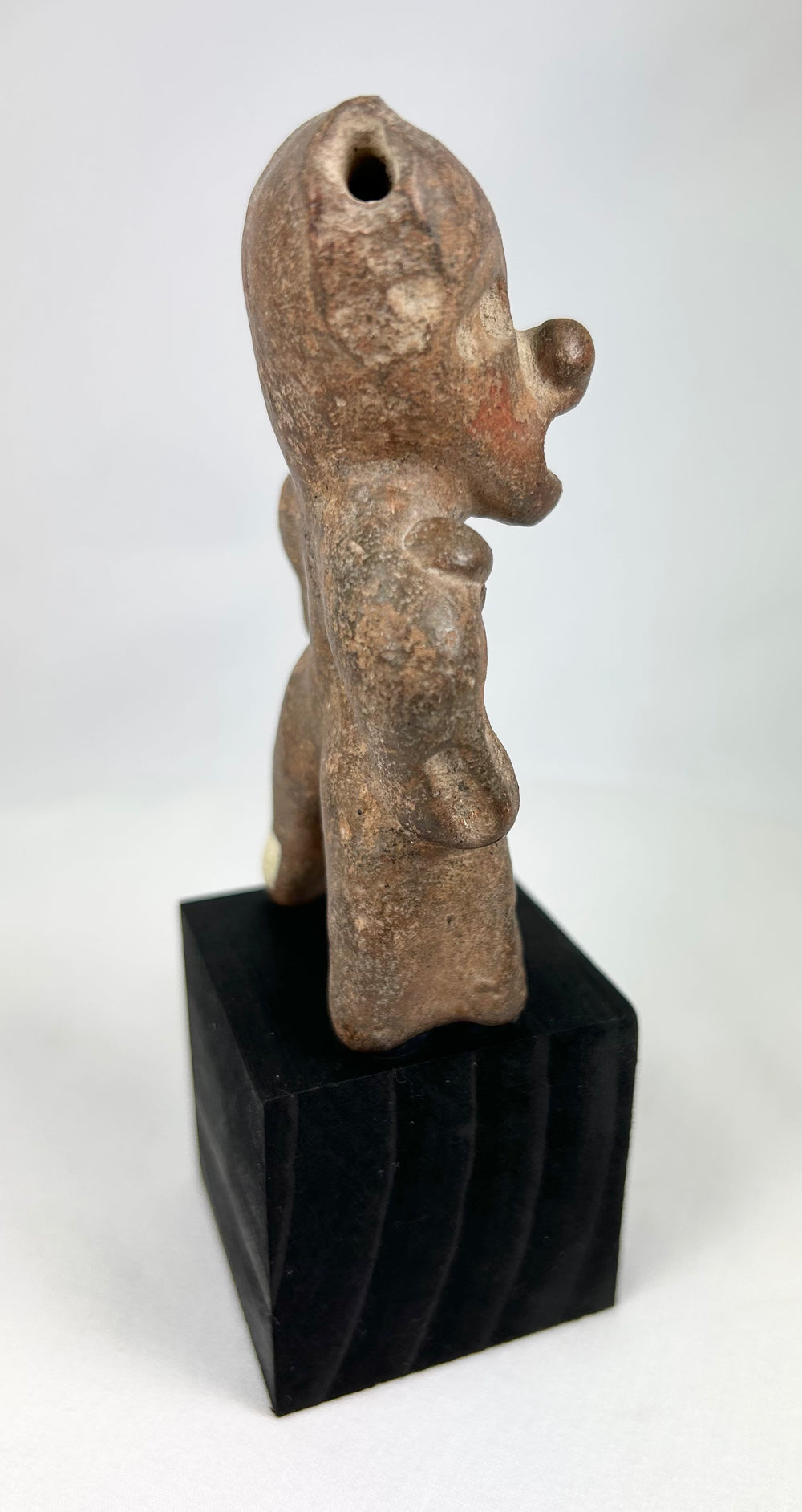 West Mexican shaft-tomb terracotta figure showing expressive posture and stylized proportions