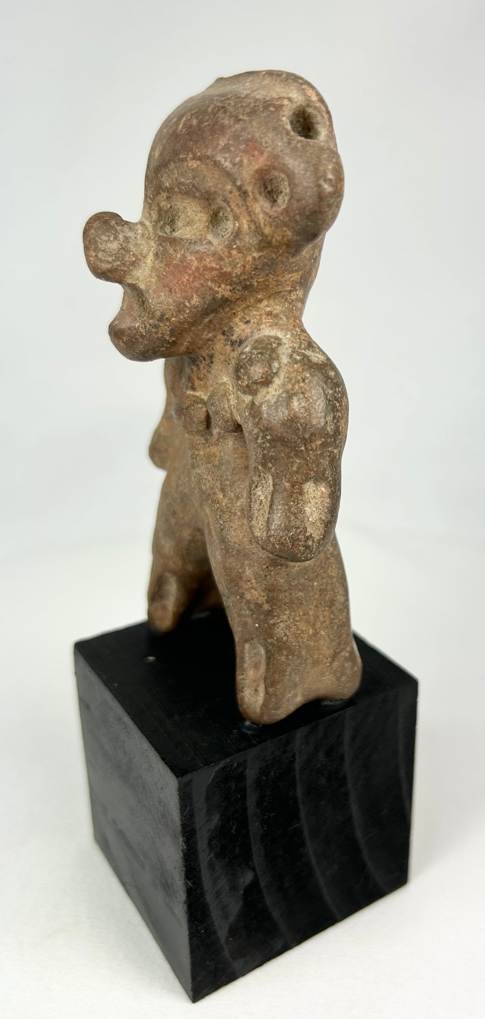 Archaeological terracotta figure from Pre-Columbian West Mexico with surface encrustation