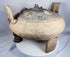 Close-up of the pierced domed lid featuring applied miniature animal figures from an ancient Chinese ritual vessel.