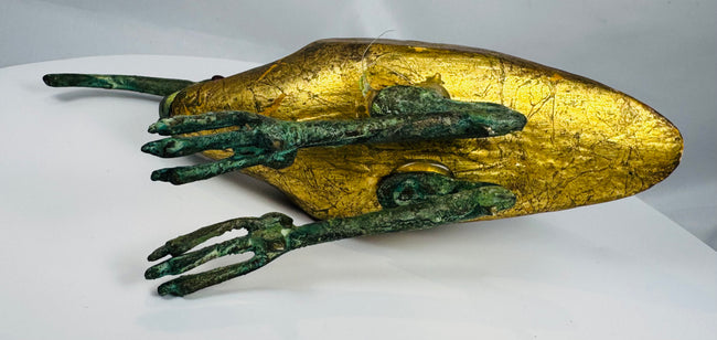 Egyptian Revival decorative sculpture with a later-applied gilt finish, verdigris patina, and graceful ibis silhouette.