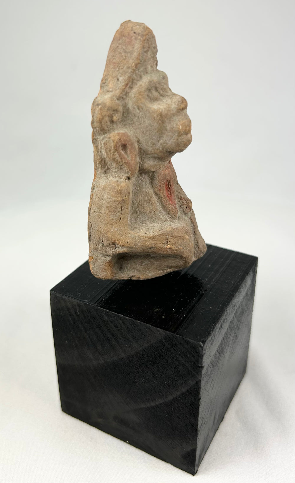 South Asian terracotta anthropomorphic figurine, early centuries CE, hand-molded with faint pigment remains