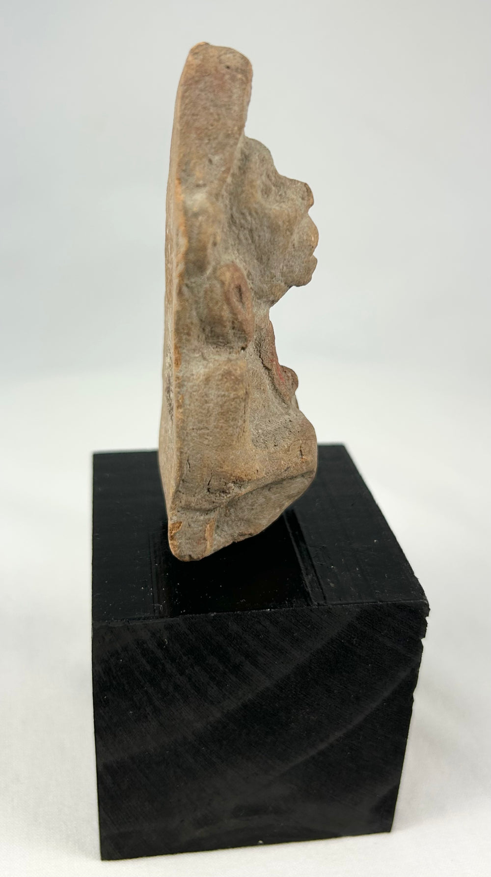 Ancient Indian terracotta votive figure, 3rd–6th century CE, stylized features, mounted on display base