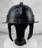 Seventeenth-century German or Dutch forged iron helmet featuring radiating flutes and original ring finial.