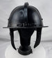 Seventeenth-century German or Dutch forged iron helmet featuring radiating flutes and original ring finial.