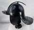 Antique European military helmet from the Thirty Years' War era with articulated neck guard and forged iron construction.