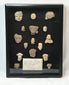 Ancient Mesoamerican terracotta fragment collection, 16 ritual heads and maskettes, 200 BCE–900 CE, shadowbox mounted