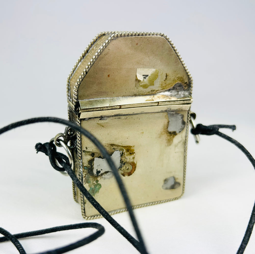 Historic Tibetan wearable reliquary box used for pilgrimage protection