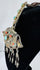 Museum-quality Tibetan gau pendant from the Himalayan region with decorative repoussé details and sacred amulet compartment.
