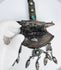 Traditional Tibetan devotional amulet container with repoussé decoration, turquoise settings, and ceremonial pendants.