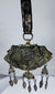 Authentic Himalayan ceremonial ornament featuring turquoise, coral, silvered copper alloy, and ornate repoussé craftsmanship.