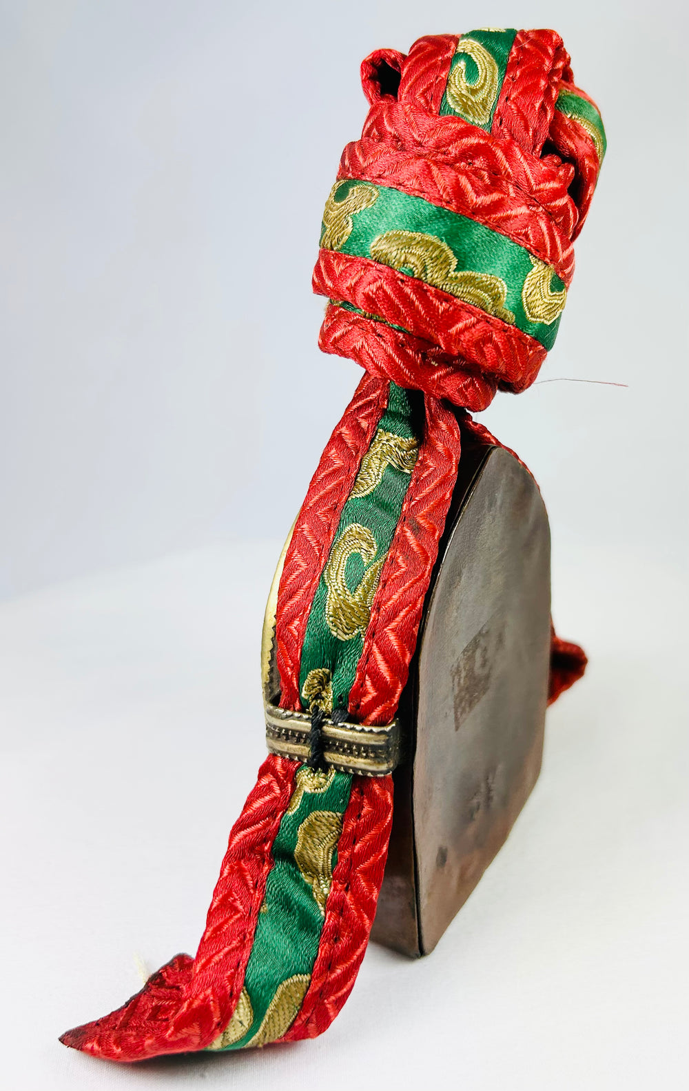 Himalayan Tibetan gau amulet box with brass inscriptions and traditional fabric carrying case