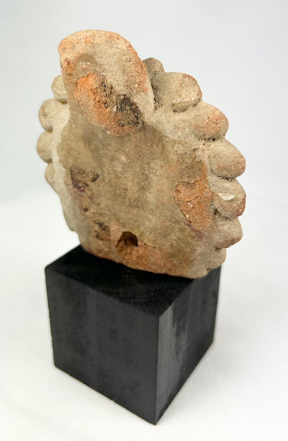 Ancient temple guardian sculpture from Java, Kala Simha motif in volcanic andesite, Majapahit period