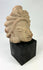 Javanese Majapahit temple fragment, Kala Simha guardian head carving with stylized radiating mane