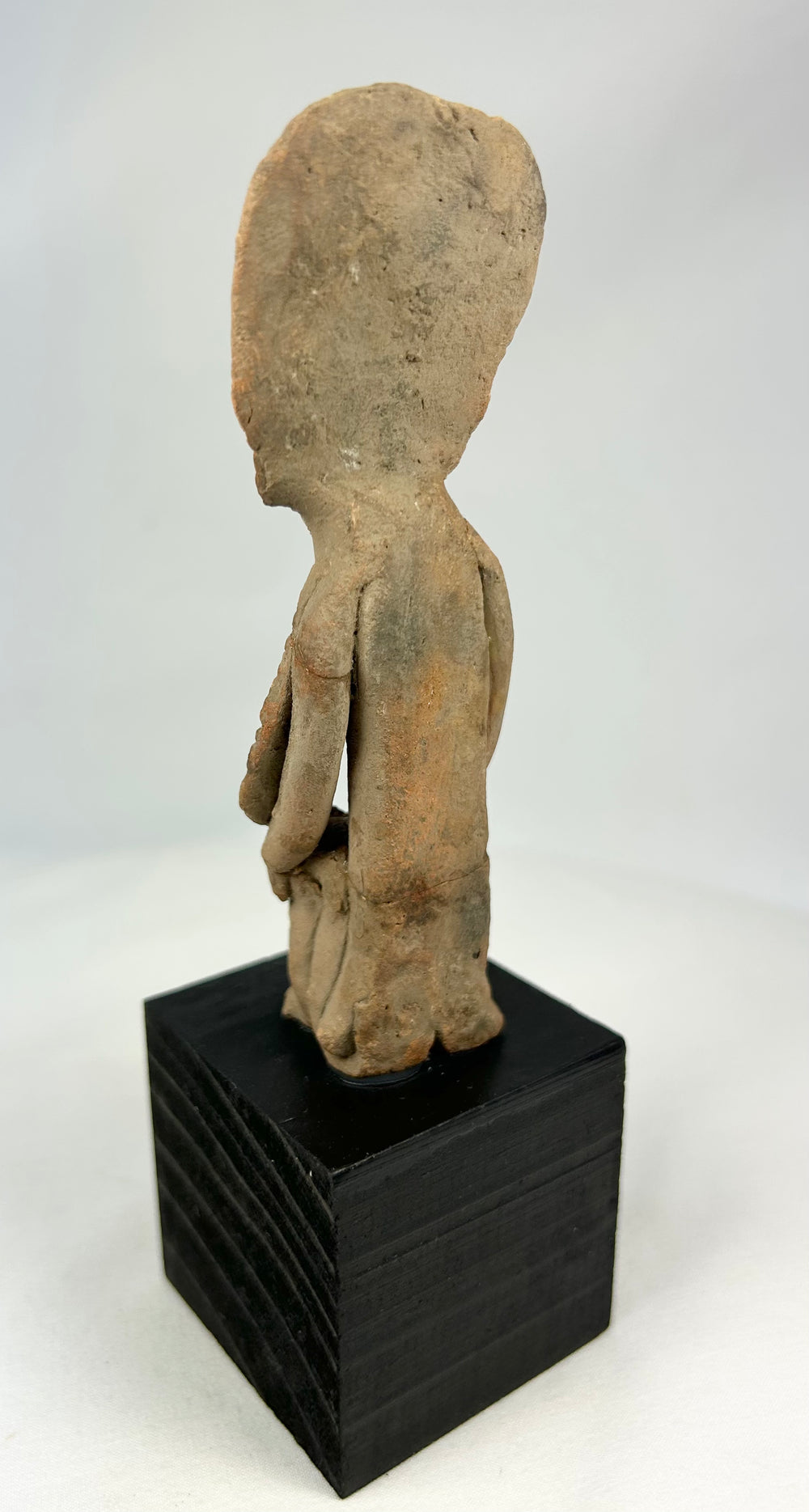 Pre-Columbian terracotta effigy, West Mexico, abstract geometric features, mineral traces, display base