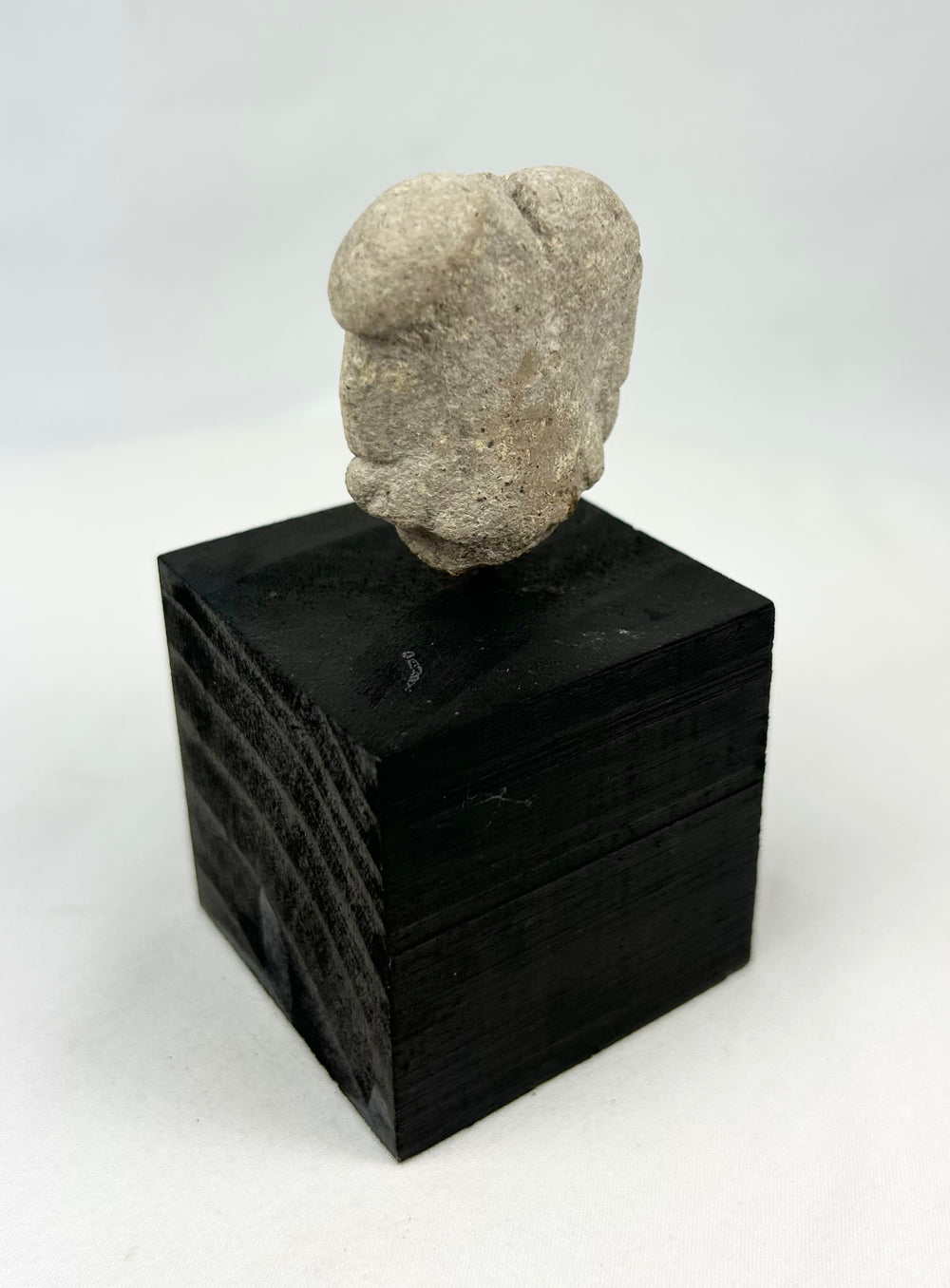 Shaft-tomb culture terracotta head fragment with almond eyes and defined nose