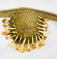 Papua New Guinea shamanic adornment with animal teeth and central cowrie shell