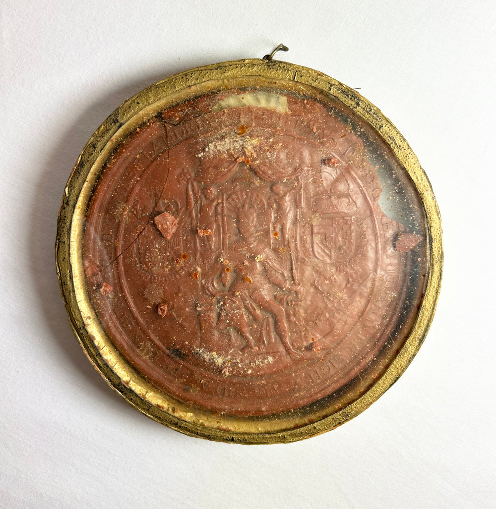Royal red wax seal depicting King Philip IV seated with Latin border text