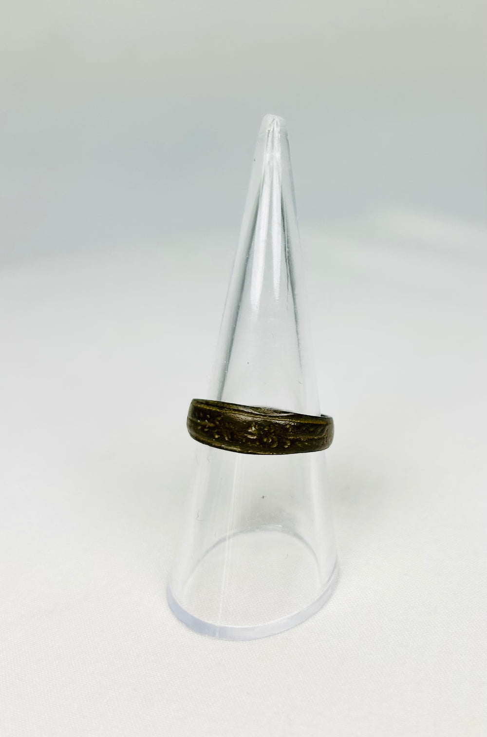 Ancient Roman ring worn as symbol of status or identity with decorative engraving